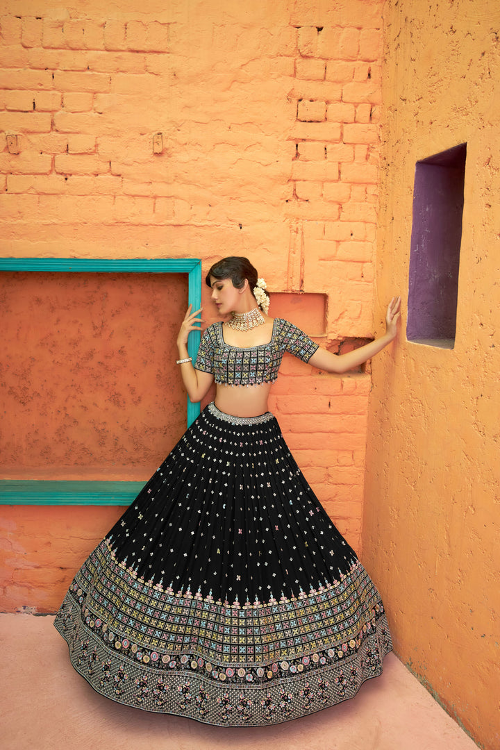 Elegant black chiffon lehenga choli featuring a designer choli and matching dupatta, perfect for special occasions