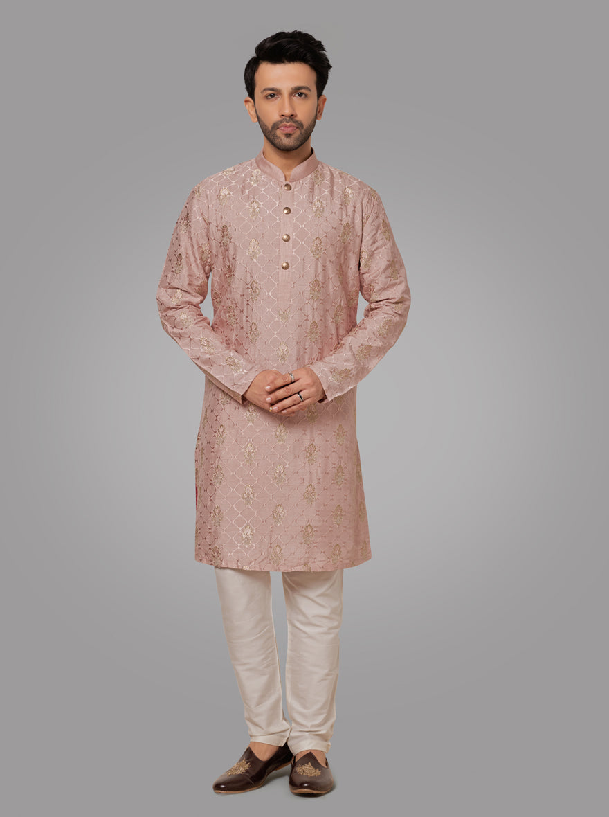 Onion pink kurta pajama set for men with embroidered details and traditional design for weddings and festive occasions.