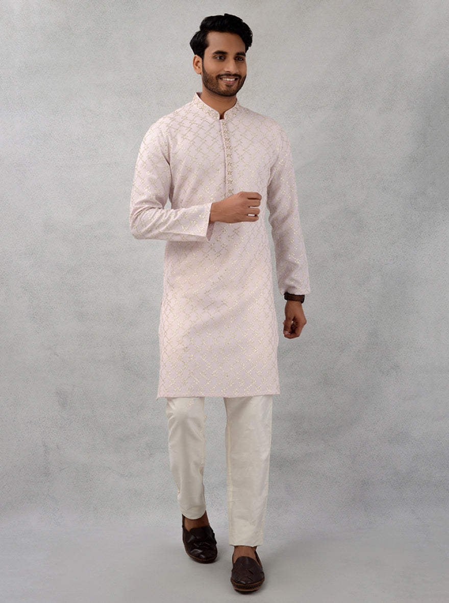 Stylish peach kurta offering comfort and style for celebrations.