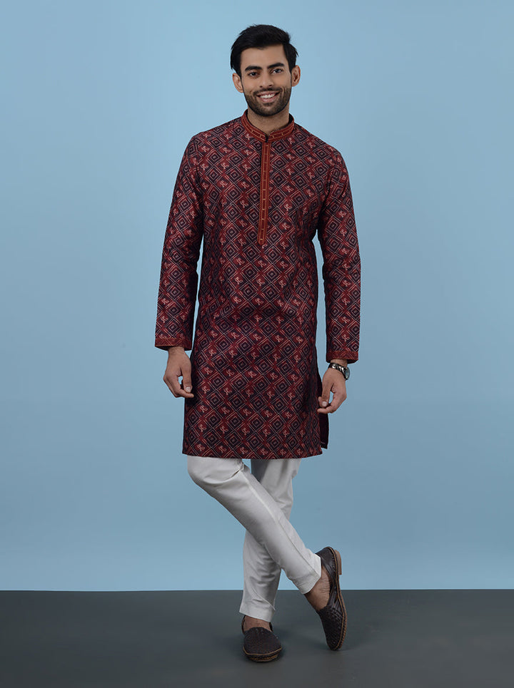 Ideal for festive gatherings, this Maroon Kurta Pajama offers a refined look.