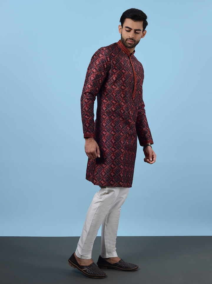 Step into style with this elegant Maroon Kurta Pajama, designed for modern men.