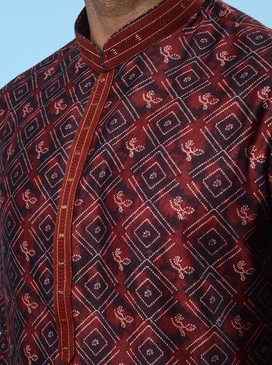 Experience luxury and comfort with this fashionable Maroon Kurta Pajama.