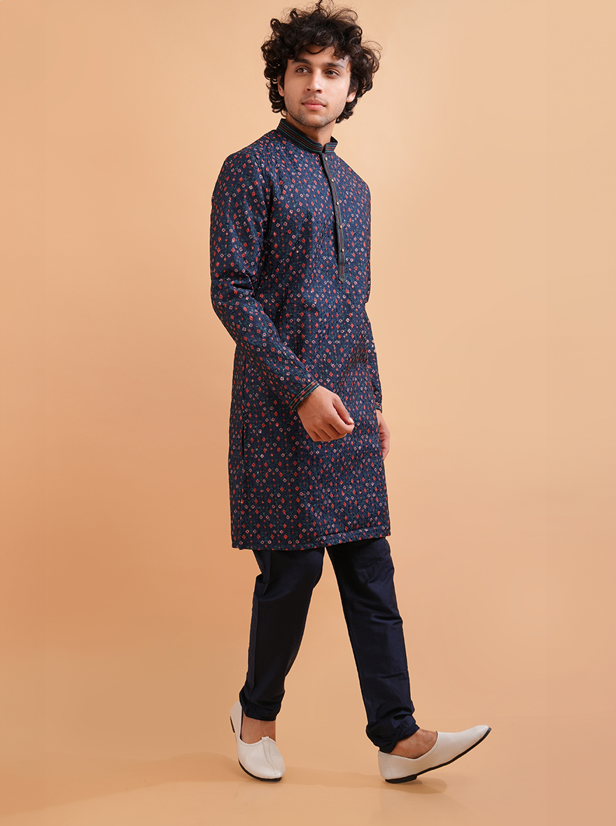 Men’s navy blue silk blend kurta pajama set, perfect for weddings and cultural celebrations.