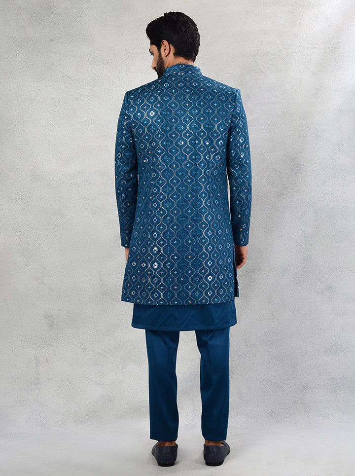 Embrace tradition with a twist in our Teal Blue Indo Western collection, tailored for the modern gentleman in the USA.