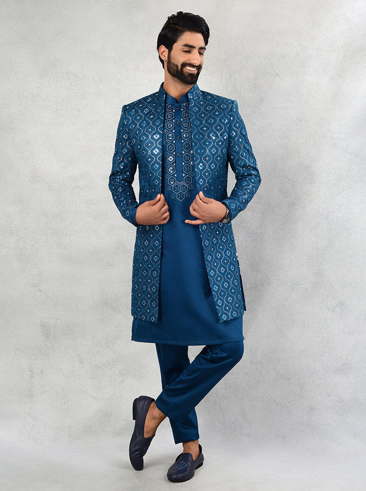 Elevate your ethnic wear with these luxurious Teal Blue Indo Western ensembles, ideal for weddings and events.