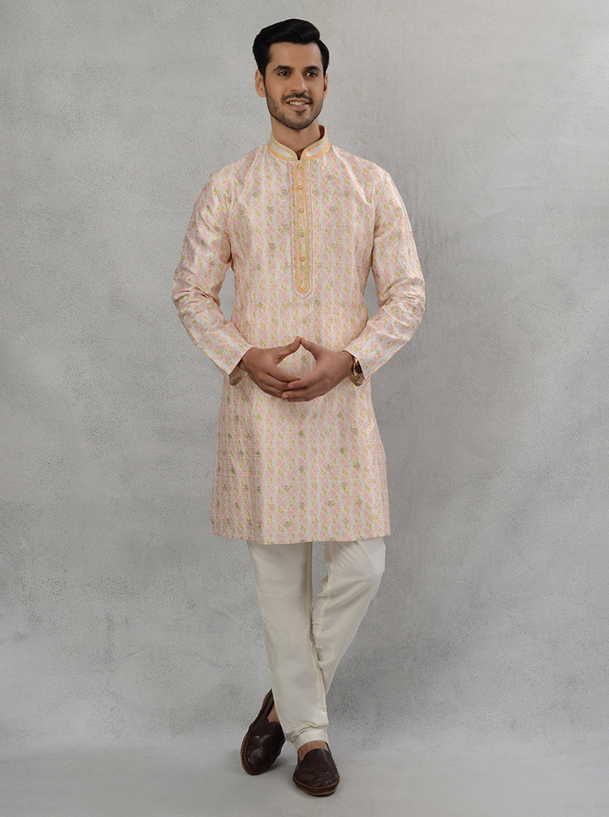 Men's cream multi-printed kurta pajama with intricate embroidery