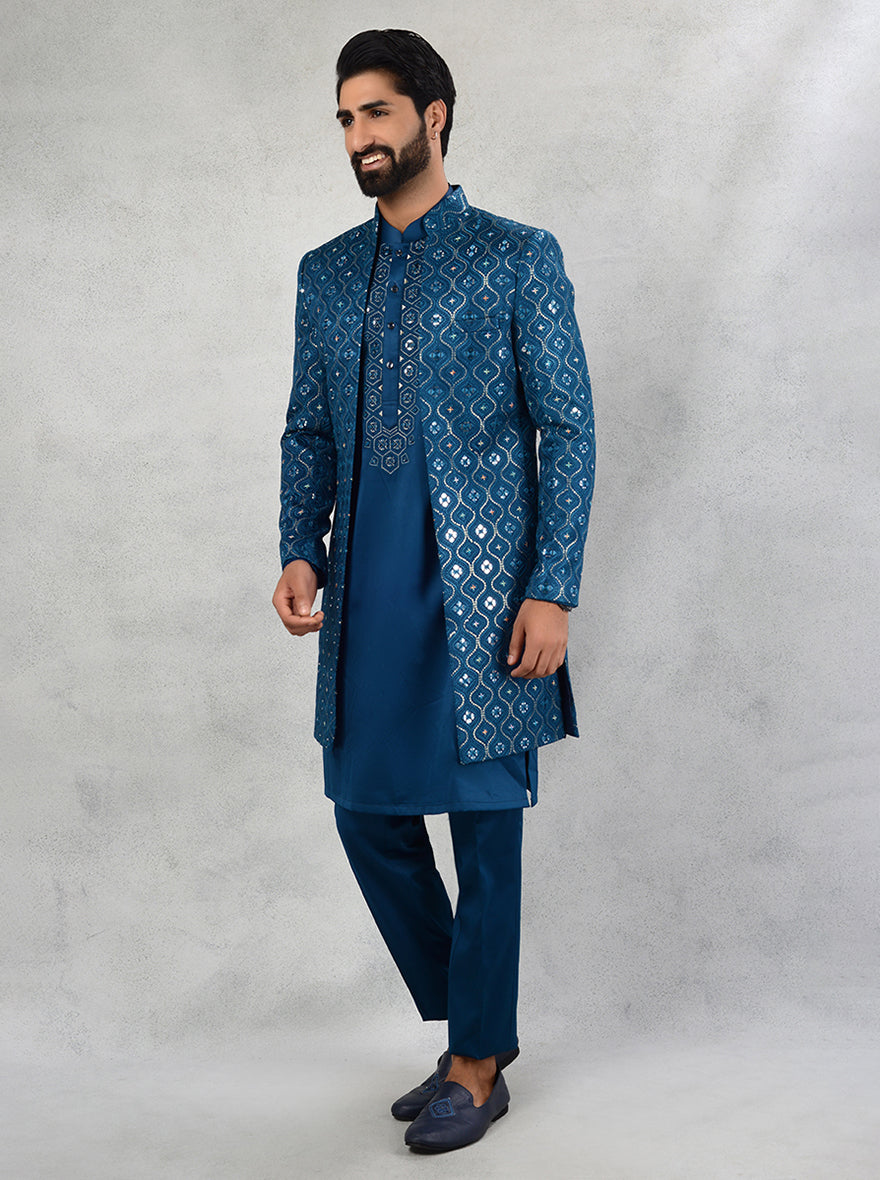 Make a statement with our striking Teal Blue Indo Western outfits, merging elegance with modern charm in the USA.