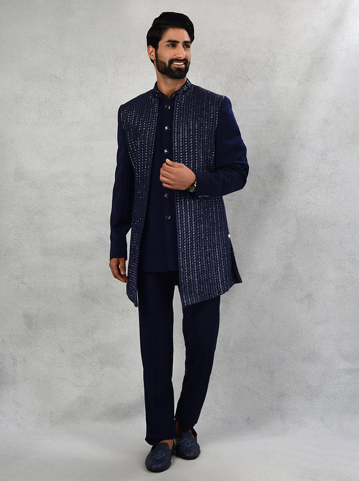 Experience the fusion of traditional design and modern embroidery with our stylish Navy Blue Indo Western.