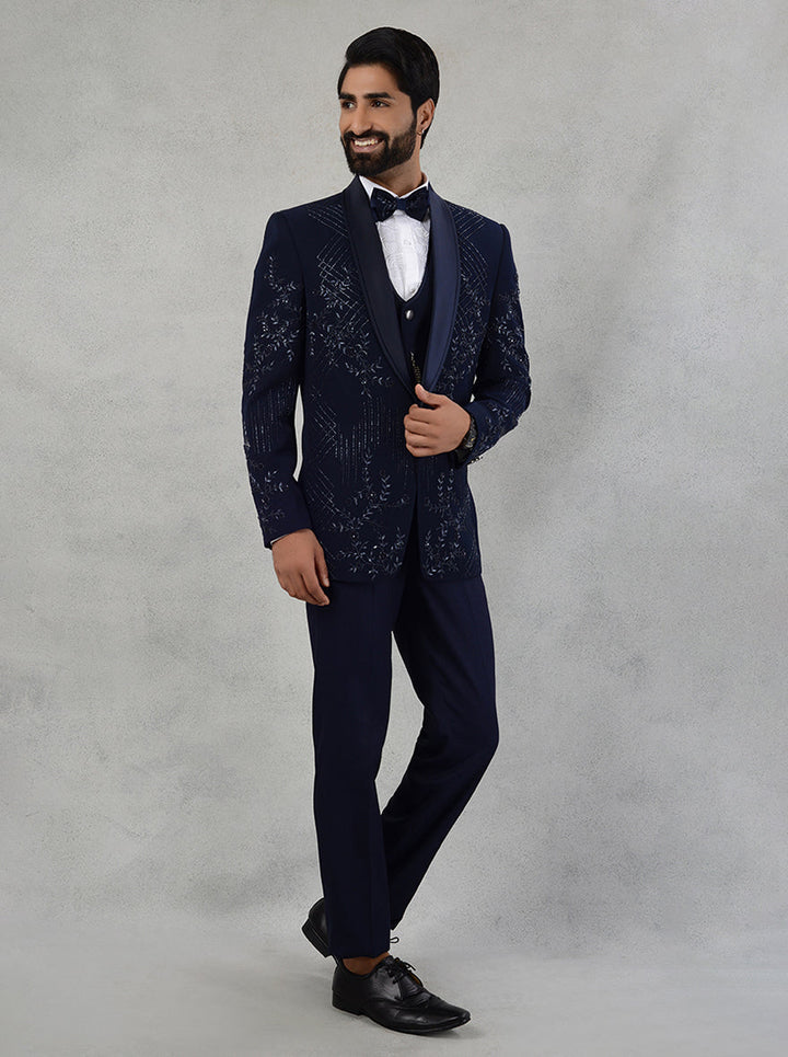 Fashionable blue suit for men, featuring stunning embroidery and a stylish shawl lapel, ideal for receptions.