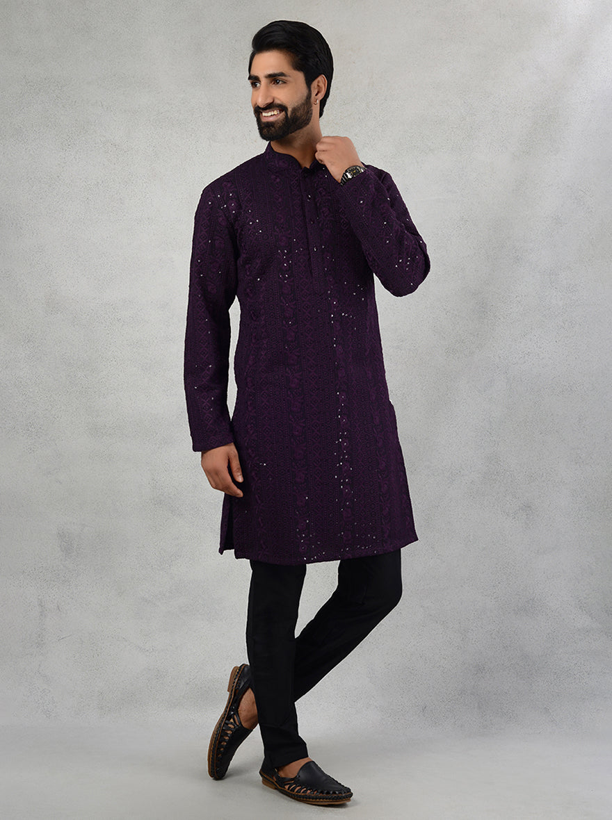 Shine at special occasions in the USA with this exquisite wine-colored kurta set for men.