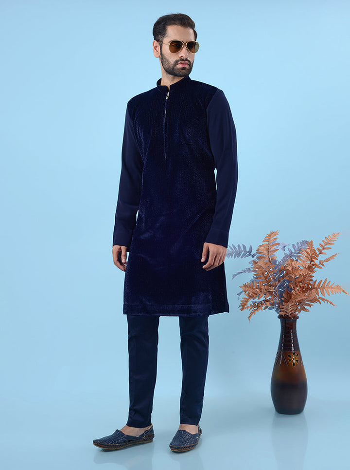 Men's blue velvet kurta pajama set, offering a classic ethnic style for traditional celebrations.