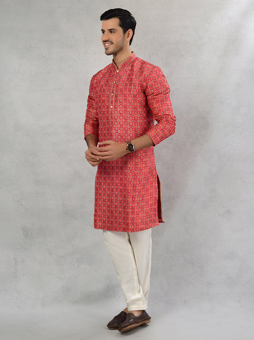 Celebrate in luxury with this silk blend pink gold kurta pajama, ideal for adding charm to your wardrobe.