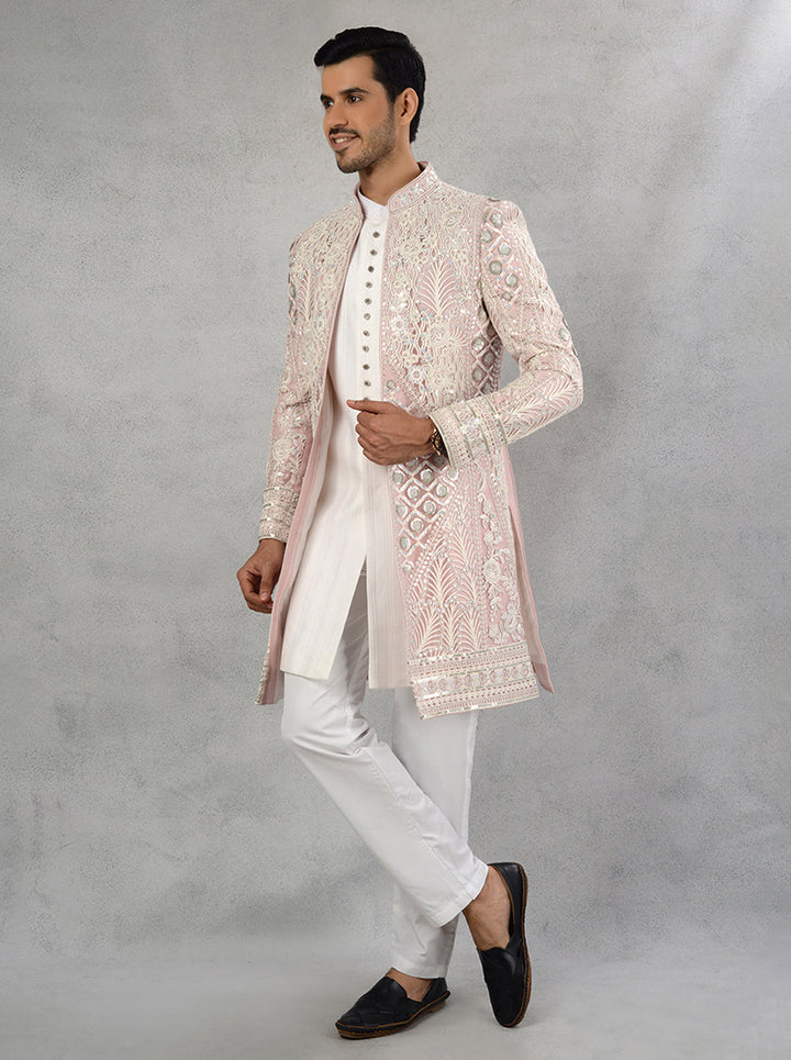 Stand out in this elegant cream and pink Indowestern outfit featuring intricate embroidery, making it an ideal choice for festive events in the USA.