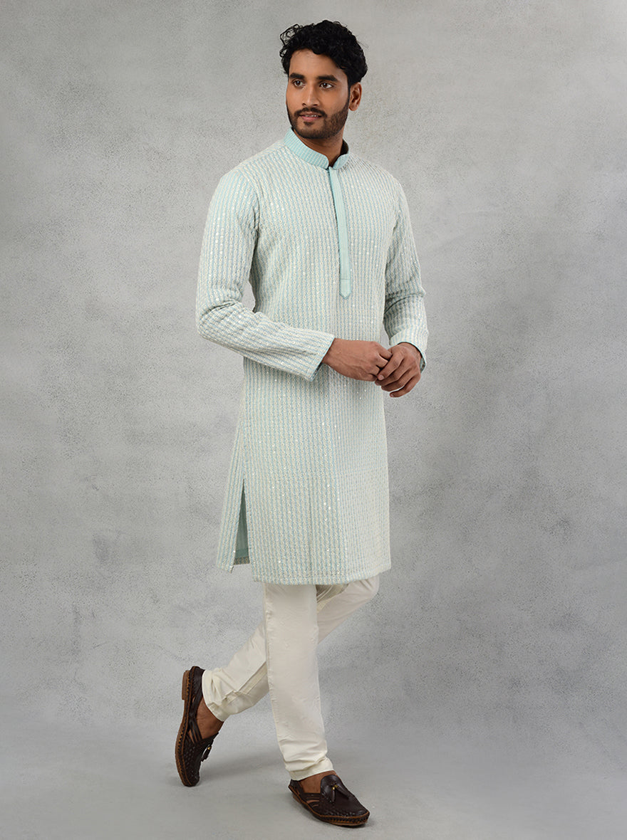 Traditional blue kurta pajama for men with intricate embroidery