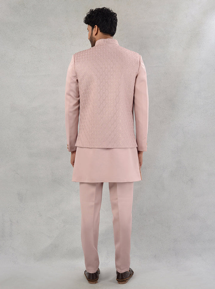 Celebrate engagement gatherings in style with this elegant onion pink kurta pajama for men.