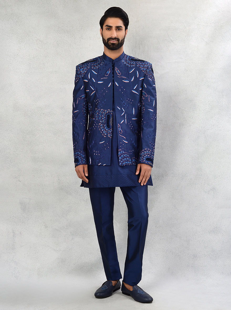 Elevate your USA style with this Blue Indo Western outfit for men, featuring silk blend and intricate resham embroidery for sangeet ceremonies.