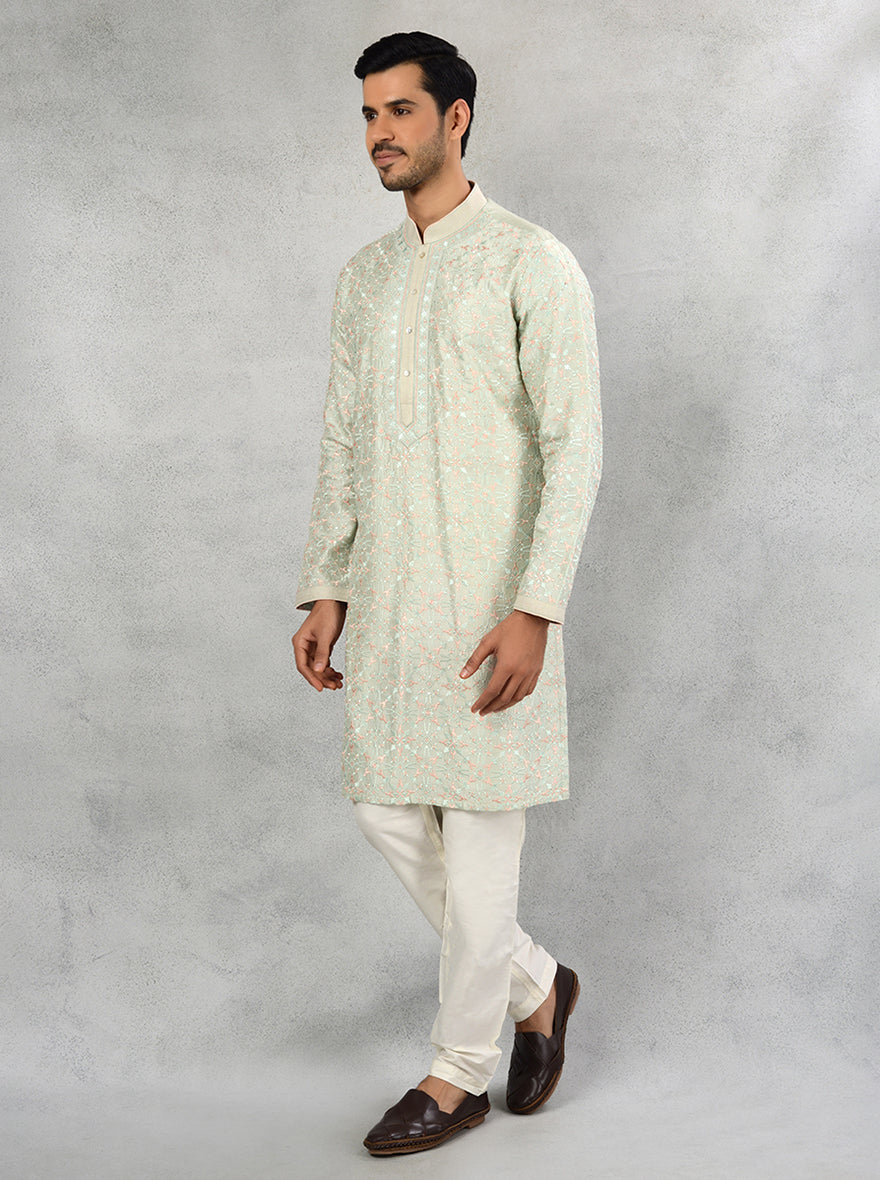 Chic mint green kurta set ideal for cultural gatherings.