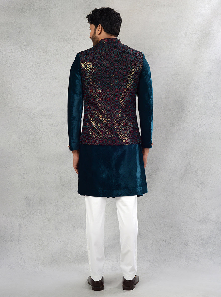 Designer embroidered greenish blue kurta set for men celebrating in the USA.