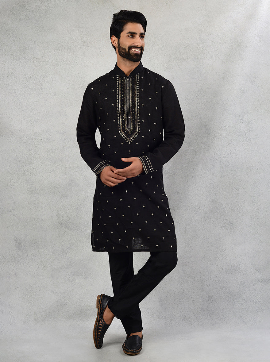 Elegant black linen kurta set designed for modern men, suitable for casual and festive events in the USA.