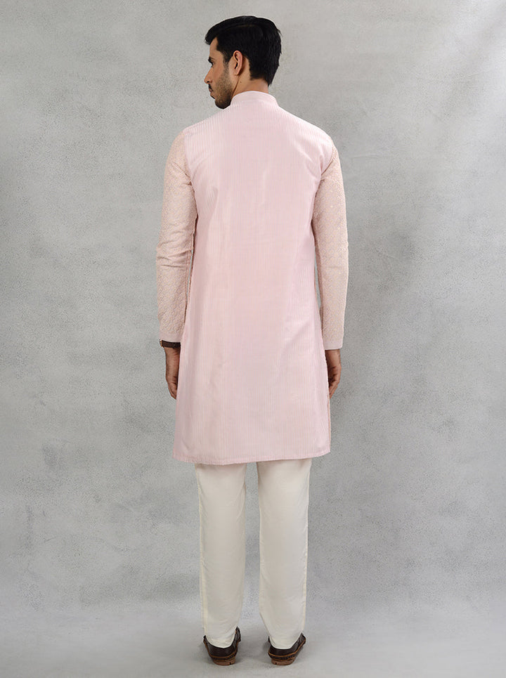 Sophisticated blush pink silk kurta set, perfect for festive gatherings in the USA.