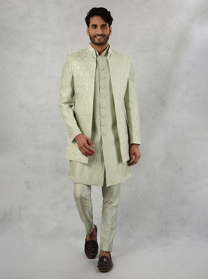 Experience elegance in this Pista Indo Western design for men, ideal for engagements and mehndi parties in the USA.