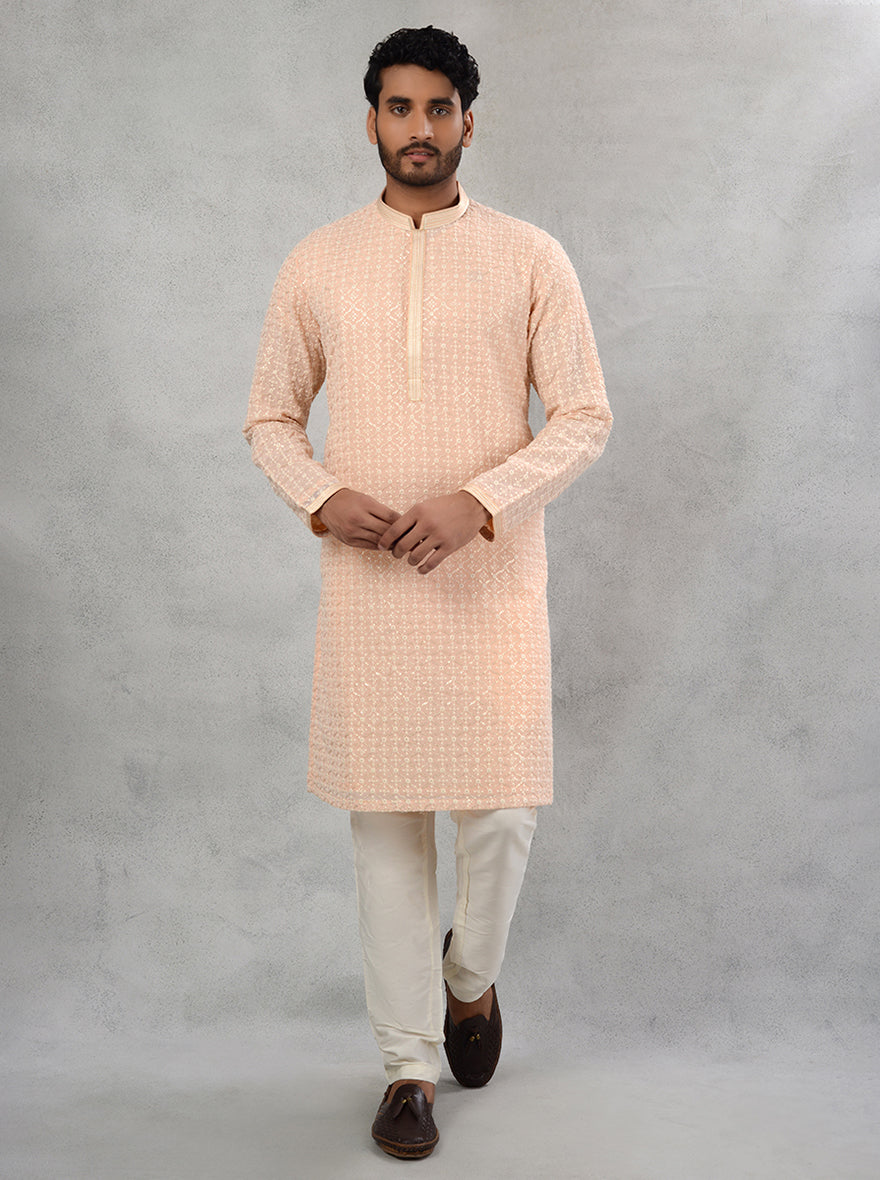 Celebrate in style with this peach kurta set for men, combining classic elegance and comfort.