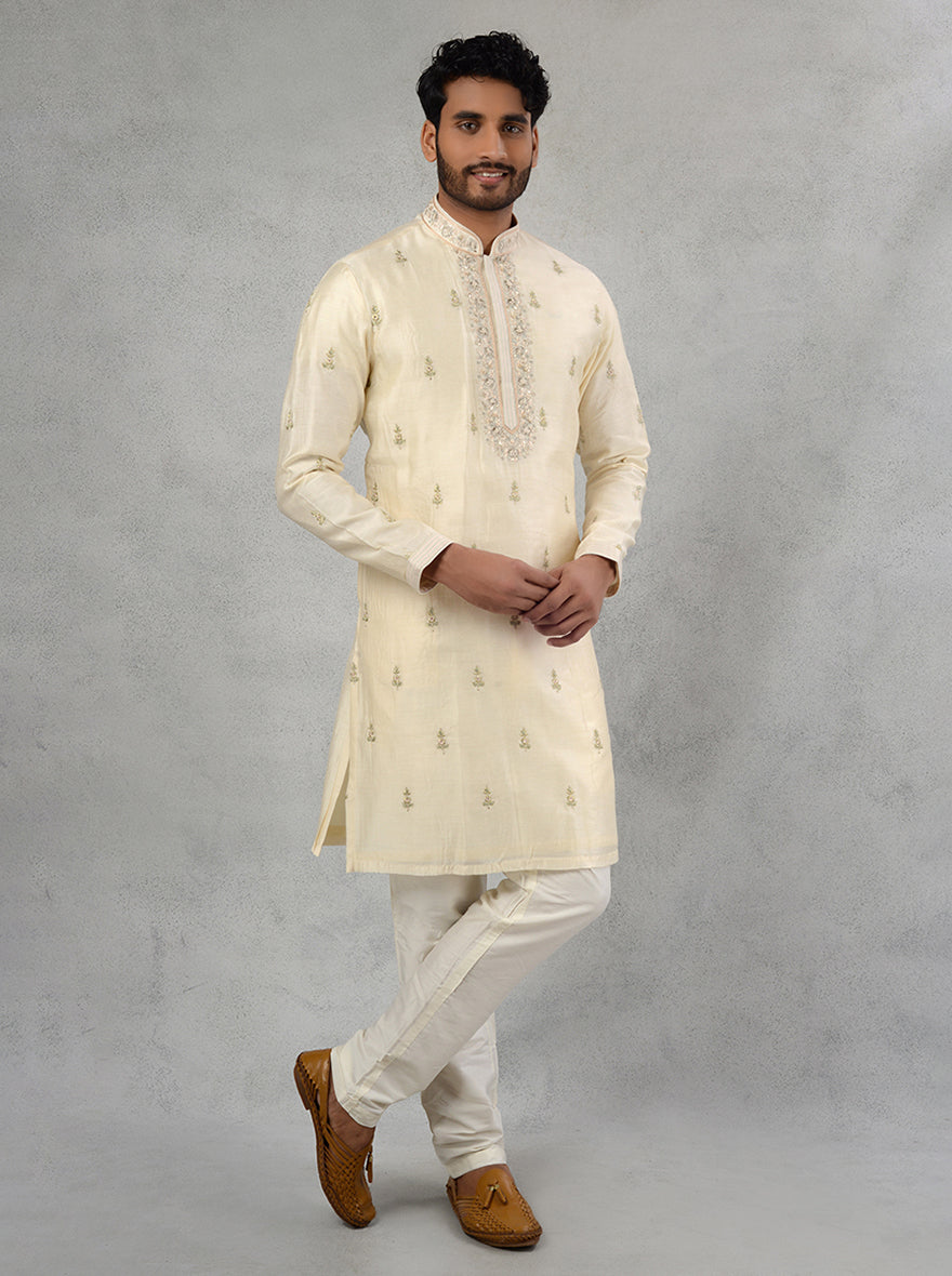 Ivory kurta set featuring exquisite embroidery, ideal for men's celebrations in the USA.