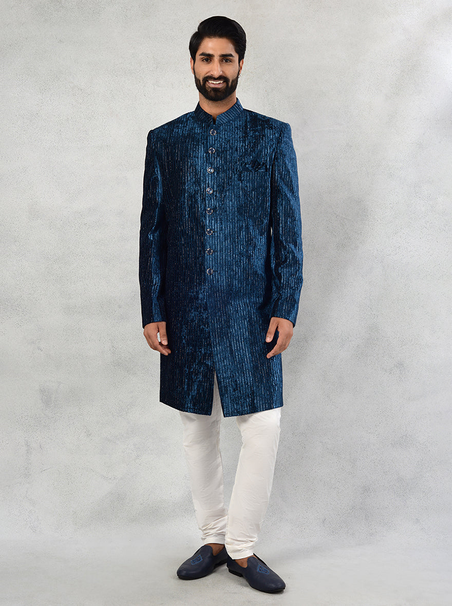 Step into sophistication with this elegant Blue Velvet Indo Western, ideal for weddings and upscale celebrations.