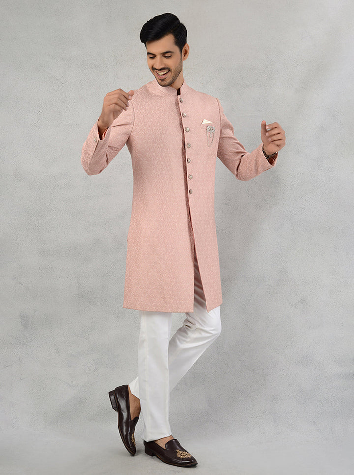 Father’s wedding wear in peach georgette with resham and sequins