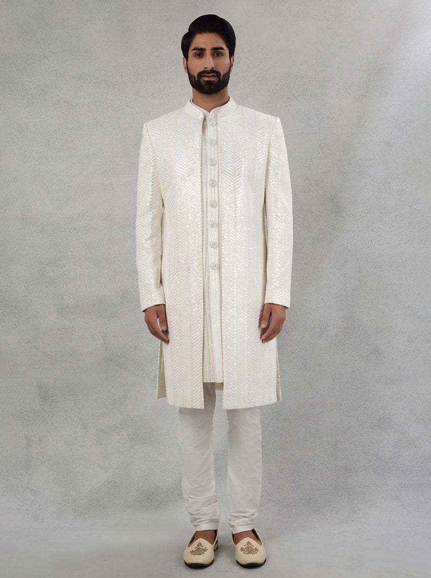 Embrace traditional charm with contemporary style in this Off-White Indo Western, perfect for weddings and events.