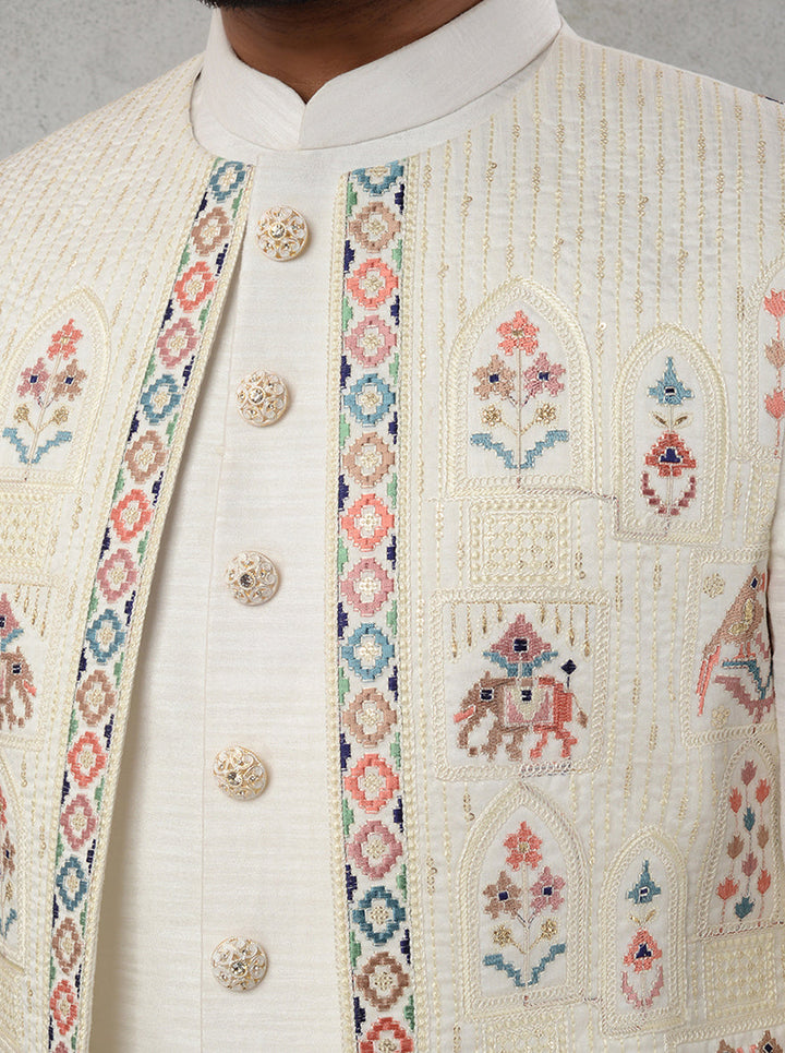 Cream Silk Blend Indowestern with intricate embroidery and straight cut.