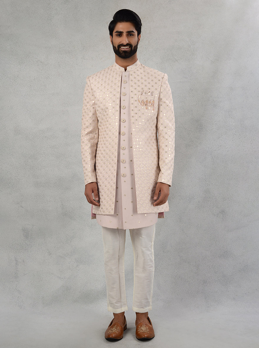 Discover the charm of our Pink Indo Western attire, crafted from premium silk blend for style and comfort.