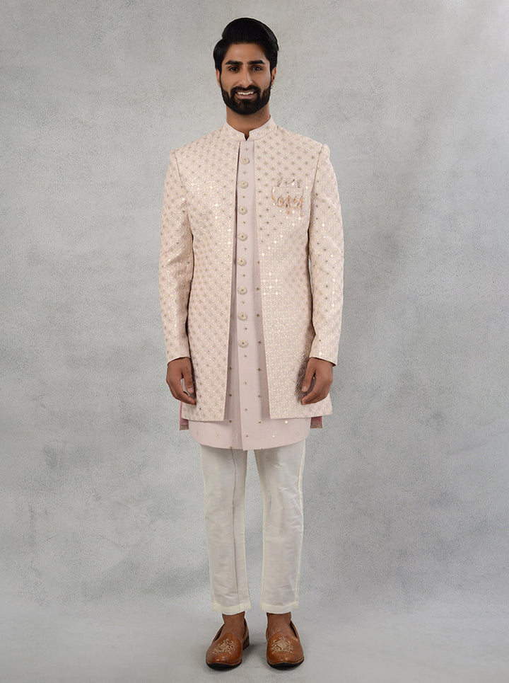 Discover the charm of our Pink Indo Western attire, crafted from premium silk blend for style and comfort.