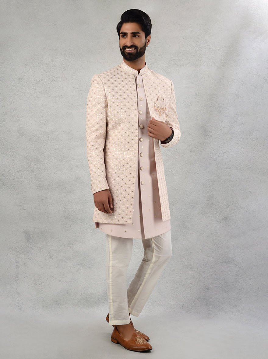 Experience elegance with our Pink Embroidered Indo Western outfit for men, perfect for sangeet ceremonies in the USA.