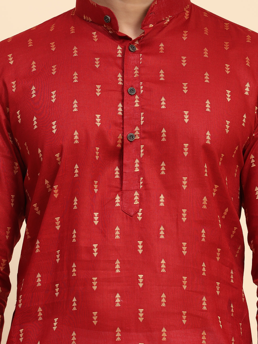 Designer Indian kurta for men in red with weaved motifs and silk bottoms.