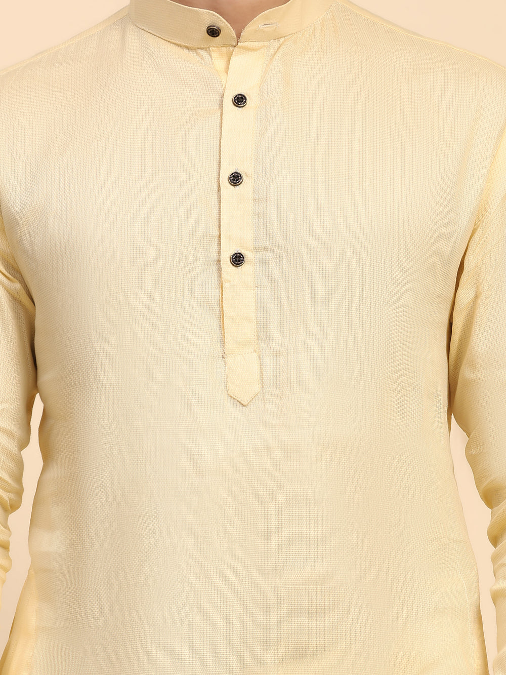 Festive cream yellow kurta set for men with intricate embroidery and premium cotton fabric.