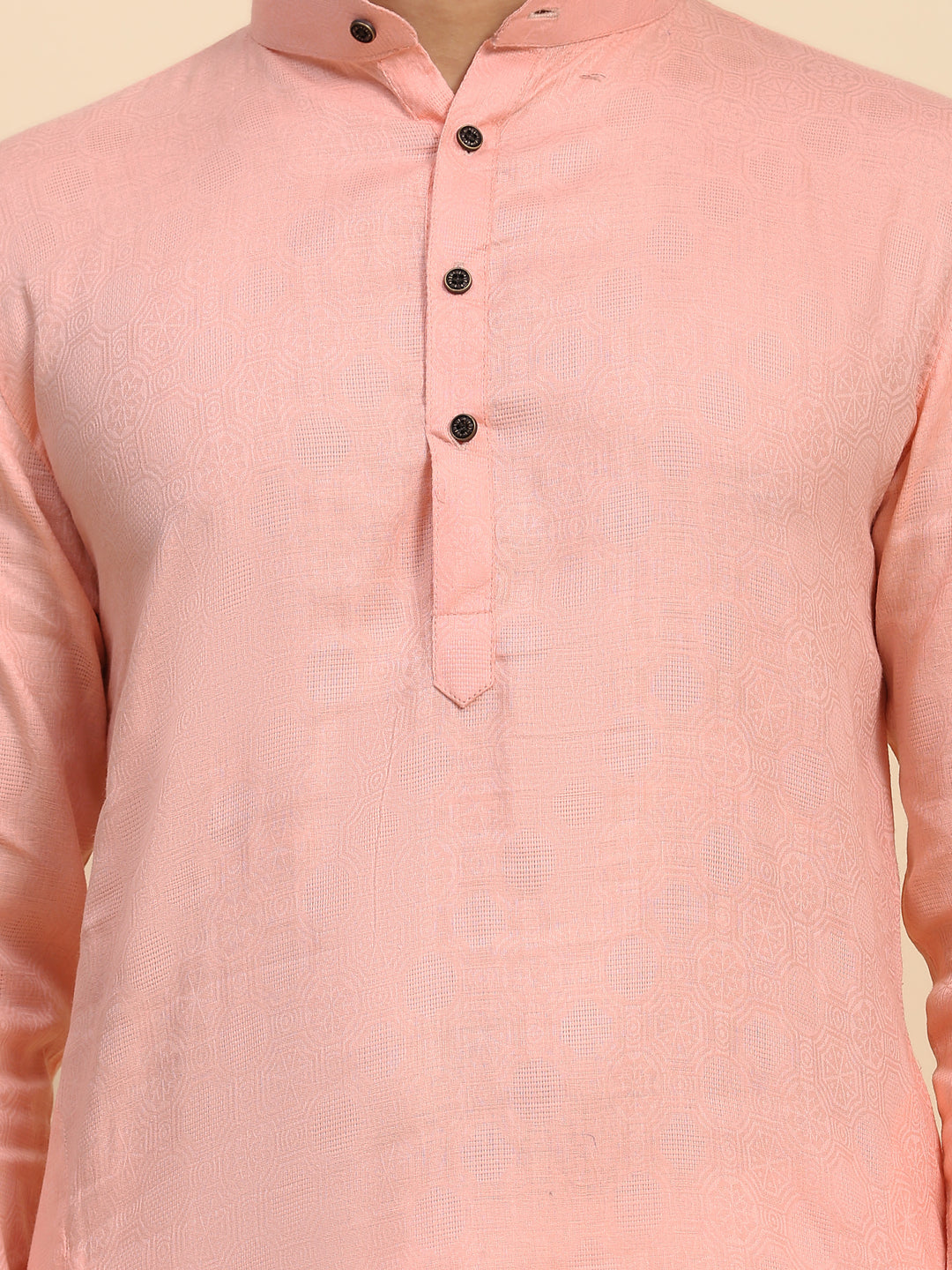 Festive baby pink kurta pajama with traditional embroidery, ideal for weddings.