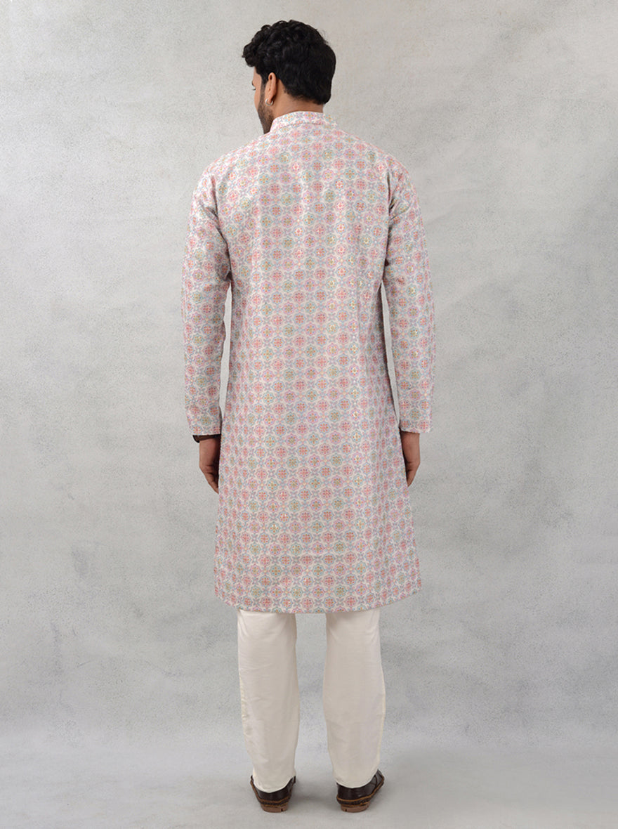 Celebrate in elegance with this cream silk blend kurta pajama, perfect for adding a sophisticated touch to your wardrobe.