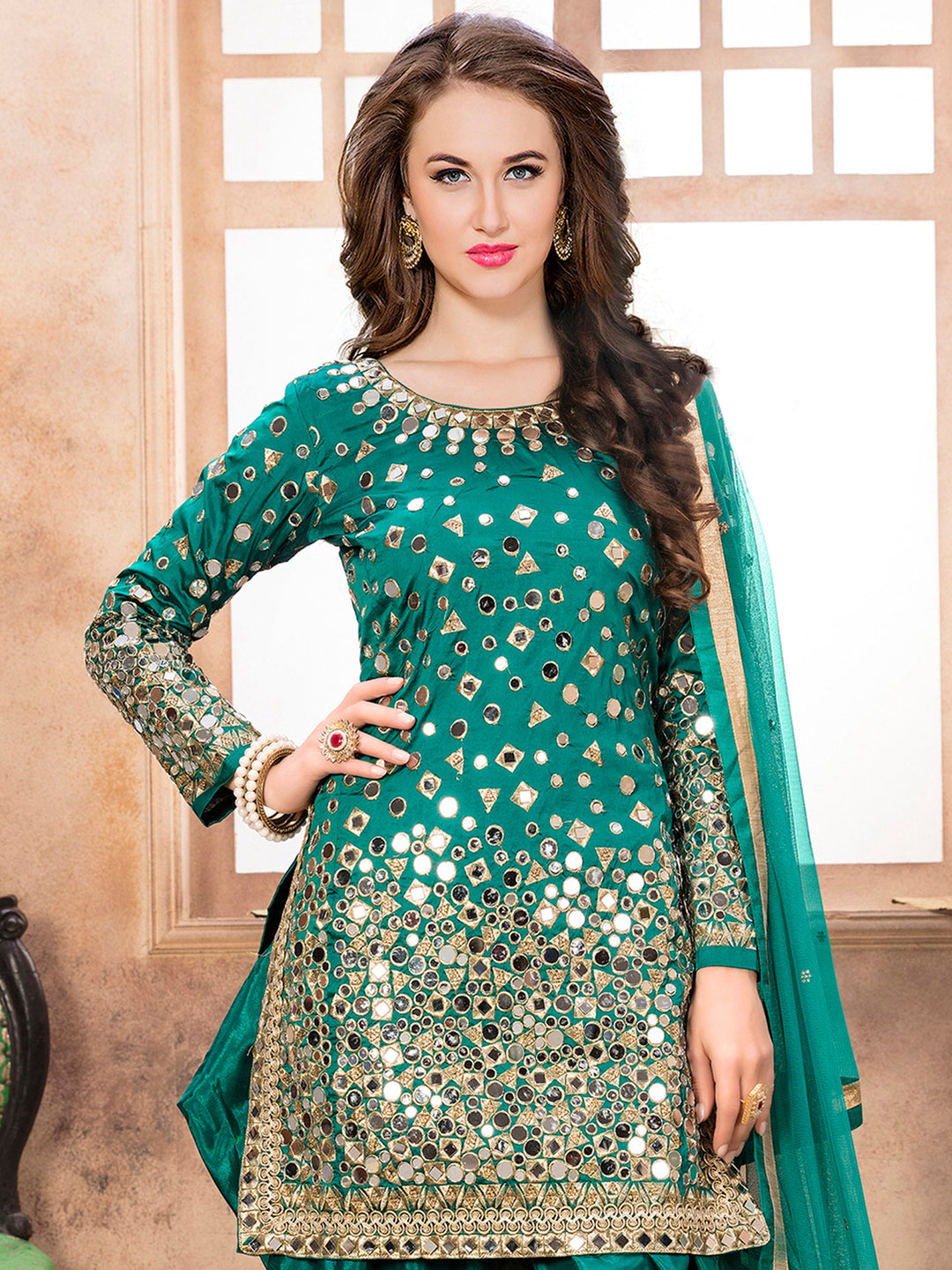 Stylish rama taffeta silk embroidered salwar kameez ideal for festive occasions.