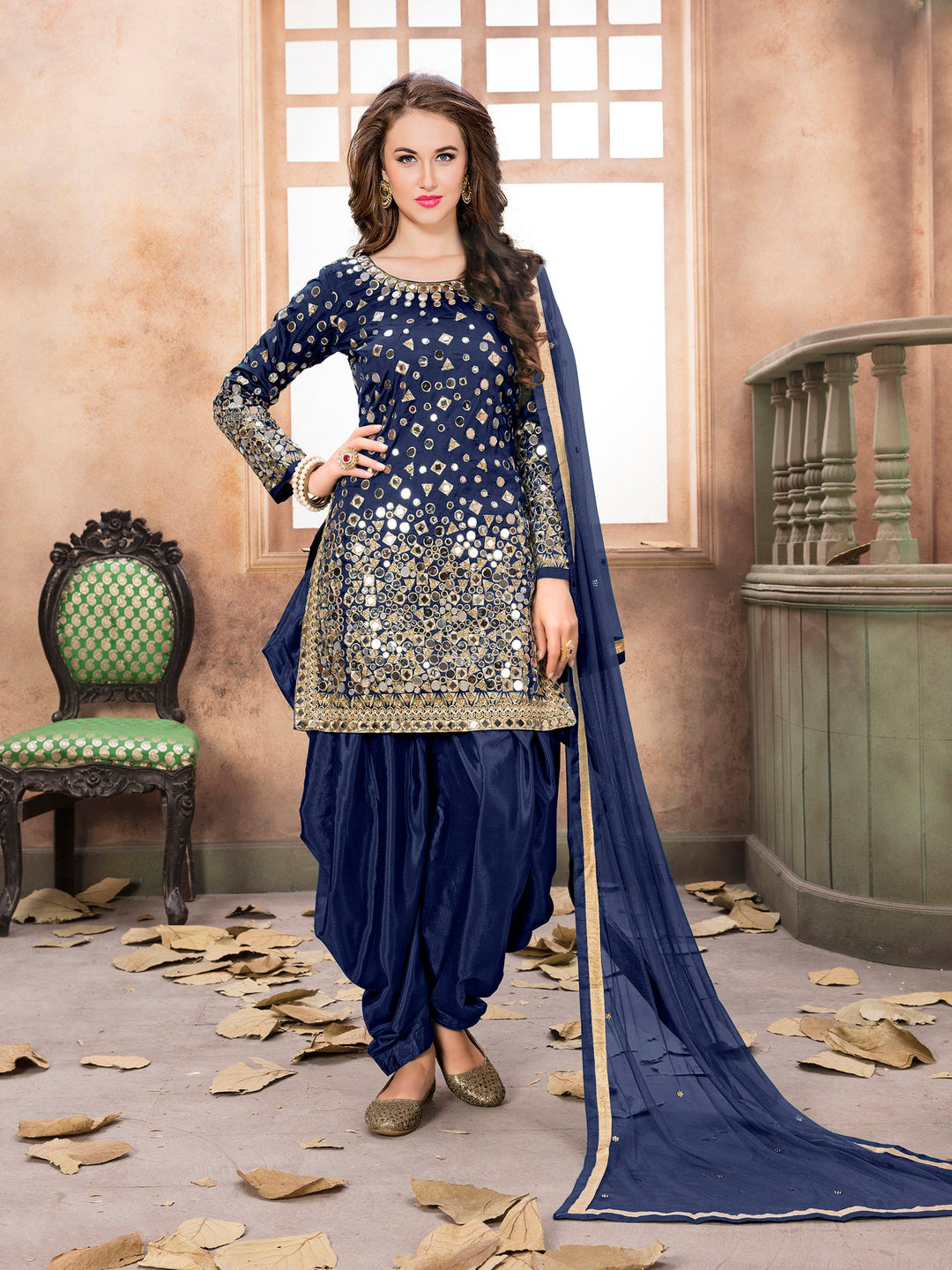 Elegant blue taffeta silk embroidered salwar kameez with intricate patterns.