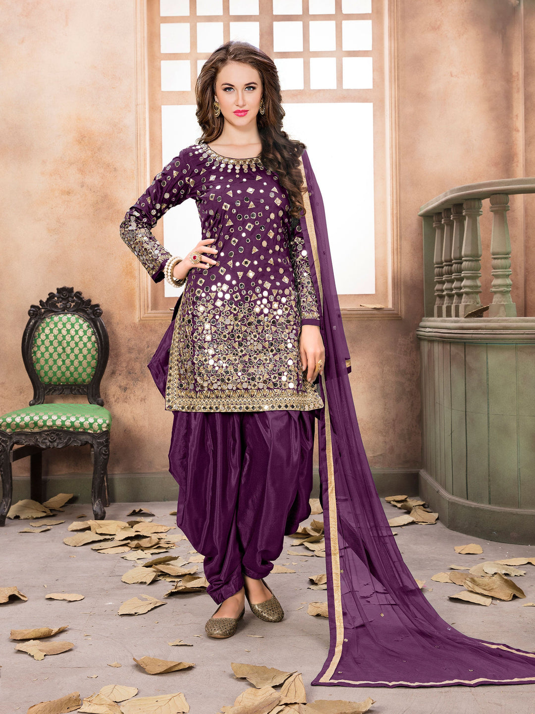 Stunning purple taffeta silk salwar kameez featuring beautiful embroidery.