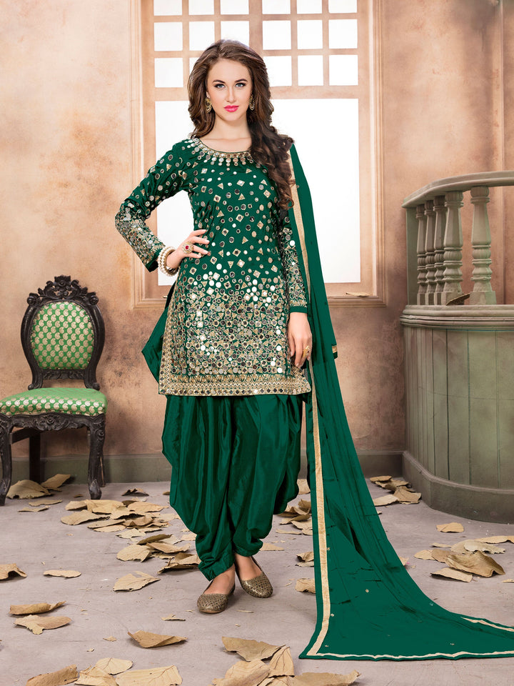 Elegant green taffeta silk embroidered salwar kameez showcasing intricate patterns.