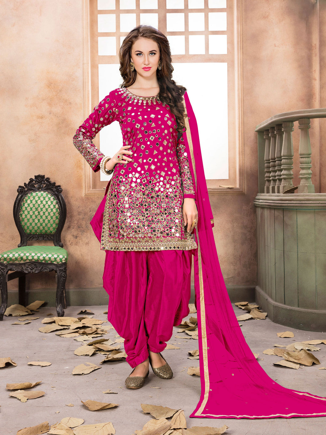 Elegant pink taffeta silk salwar kameez set featuring intricate embroidery and a comfortable fit for festive occasions.