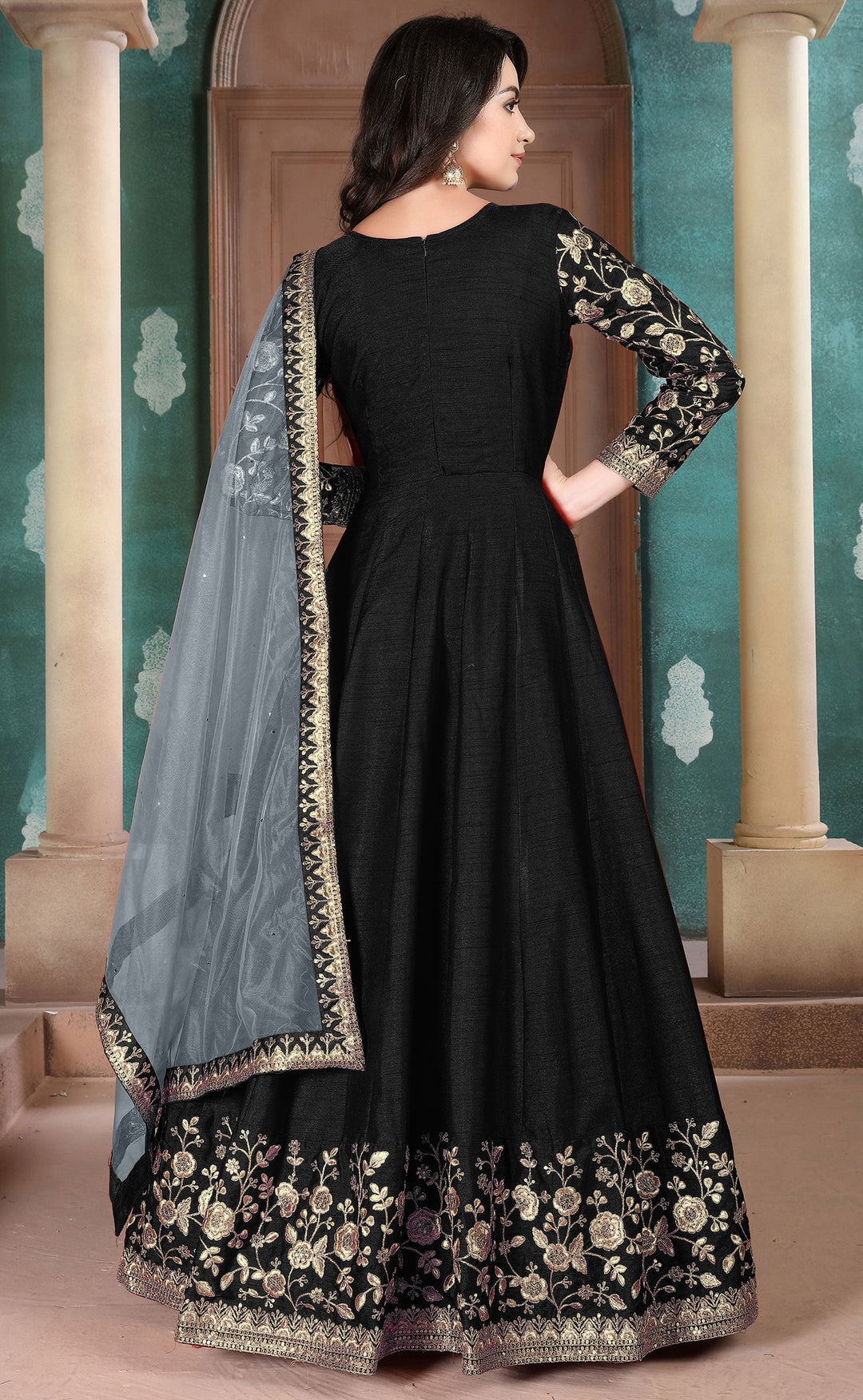 Beautifully crafted black cotton salwar kameez set, ideal for weddings and formal occasions with a stylish silhouette.