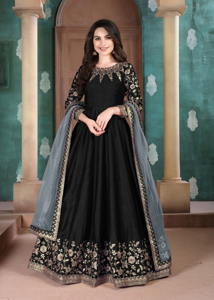 Luxurious black cotton salwar kameez, perfect for formal gatherings, featuring elegant design and comfortable fit.