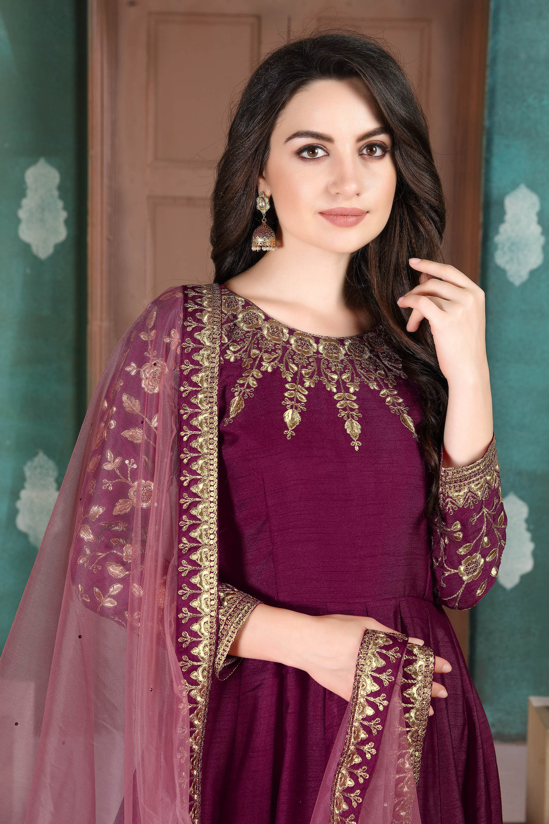 Beautifully crafted wine ethnic wear salwar kameez set, ideal for festive celebrations and weddings with luxurious fabric.