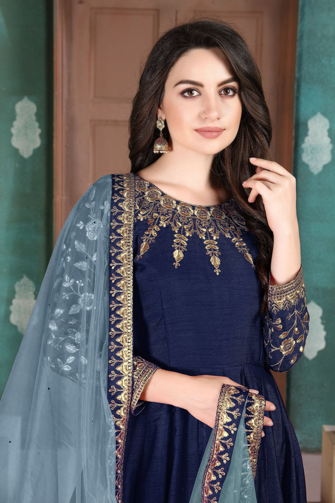 Beautifully crafted navy blue designer salwar kameez set, ideal for weddings and celebrations with luxurious fabric and details.