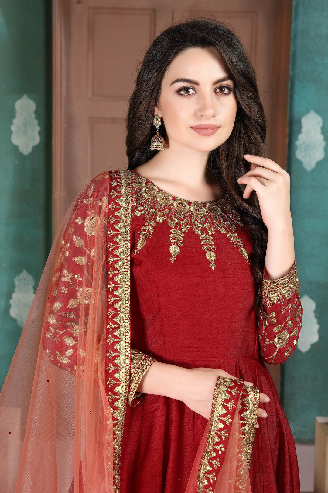 Chic red salwar kameez showcasing intricate detailing, designed for modern women celebrating special occasions in the USA.