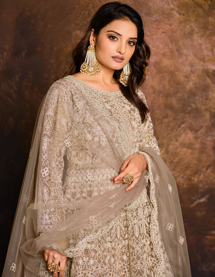 Chic beige salwar kameez showcasing classic craftsmanship, designed for modern women attending special occasions in the USA.