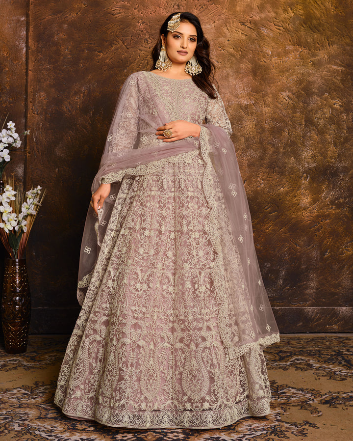 Graceful light purple salwar suits, perfect for celebrations, featuring elegant embroidery and stylish design.